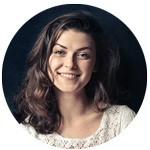 Happy young woman giving a positive review after shopping online.